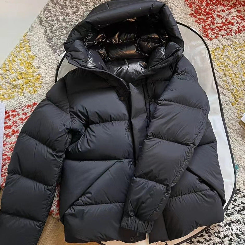 Damen Daunenjacke mit hohem Kragen und praktischen Reißverschlusstaschen ModeGeist