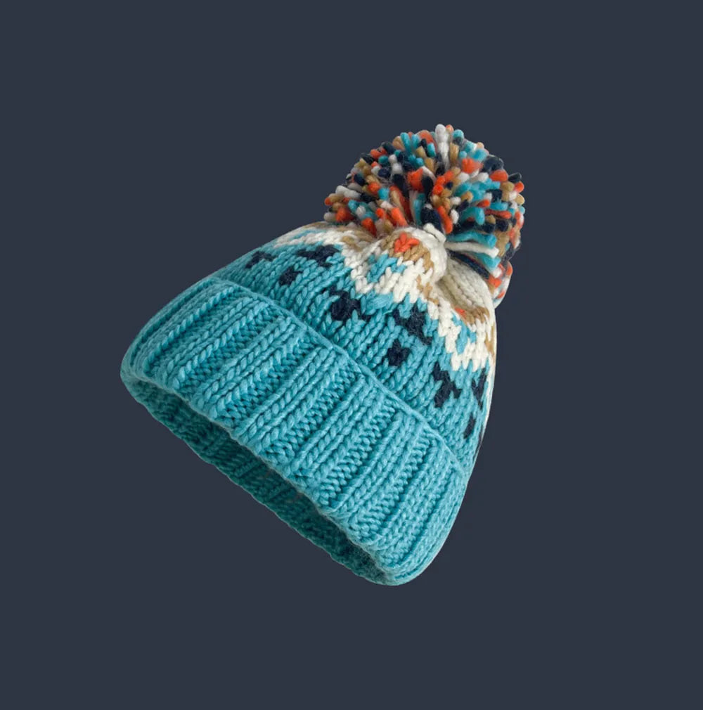 MODEGEIST Damen Winter-Mütze Strick Bommel Schneeflocken-Muster