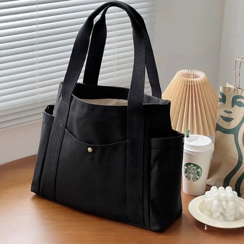 Geräumige Schultertasche aus Rimu