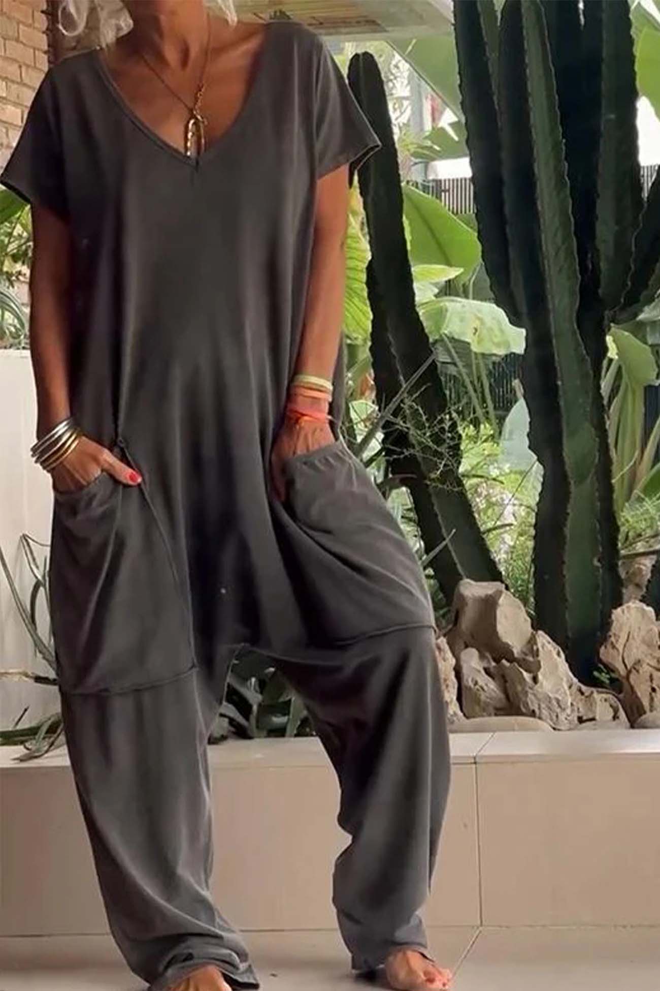 MODEGEIST Damen Jumpsuit V-Ausschnitt Kurze Ärmel Taschen Loose Fit