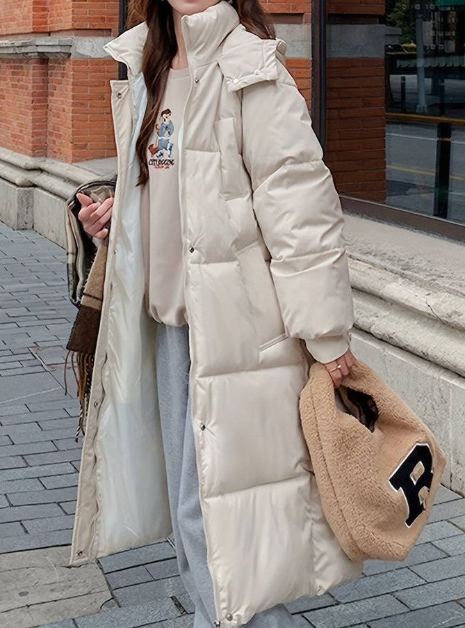ModeGeist | Lange Pufferjacke - Wasserabweisend - Gestepptes Design - Kapuze - Warm und Bequem