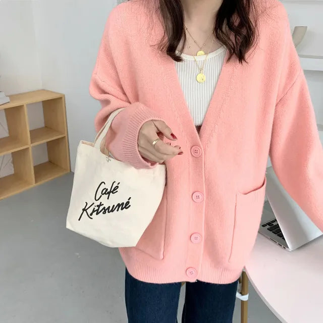 Damen-Strickjacke mit langen Ärmeln und Knöpfen