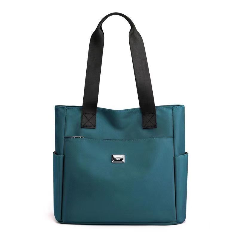 Emilias praktische, stilvolle & wasserdichte Schultertasche für unterwegs