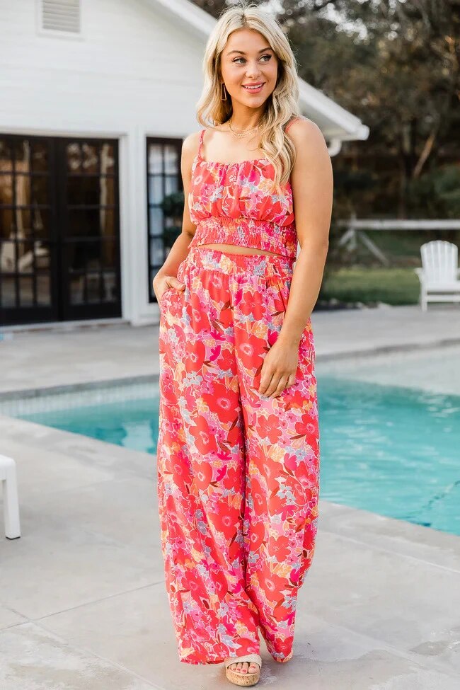 HAILEY -  Figurbetont, ärmelloser Jumpsuit mit hohem Beinansatz