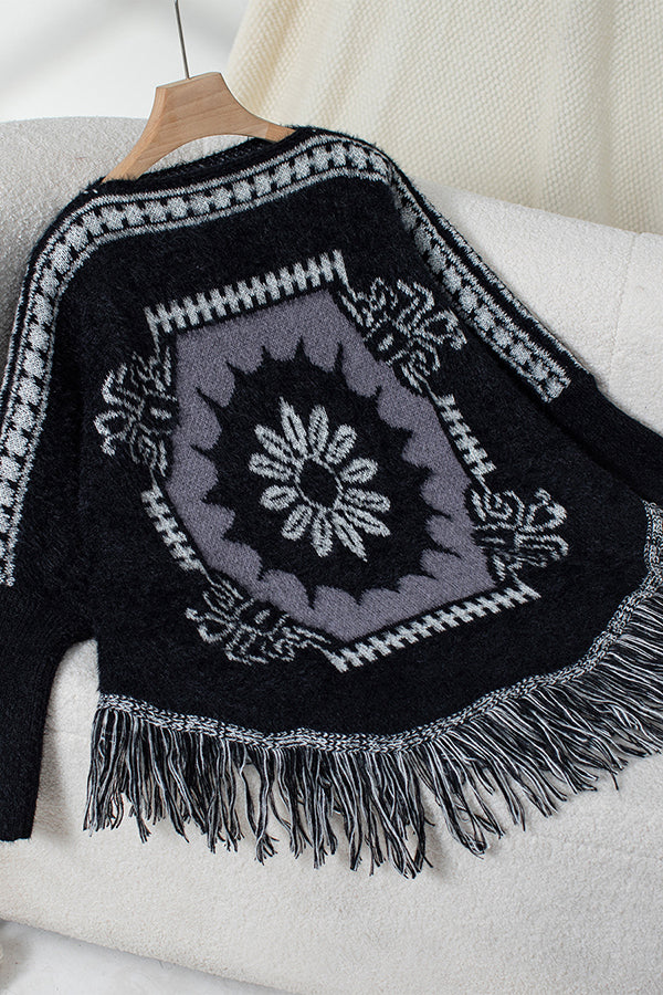 ModeGeist | Strickpullover mit Quastenabschluss