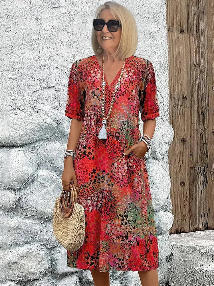 MODEGEIST Damen Midi-Kleid Lebhaftes Muster Fließend Bunt
